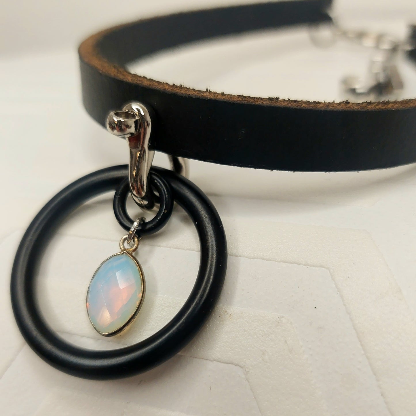 Eva Sapphire. Chic Leather Necklace with Silver oring and Sapphire Teardrop. Handmade.