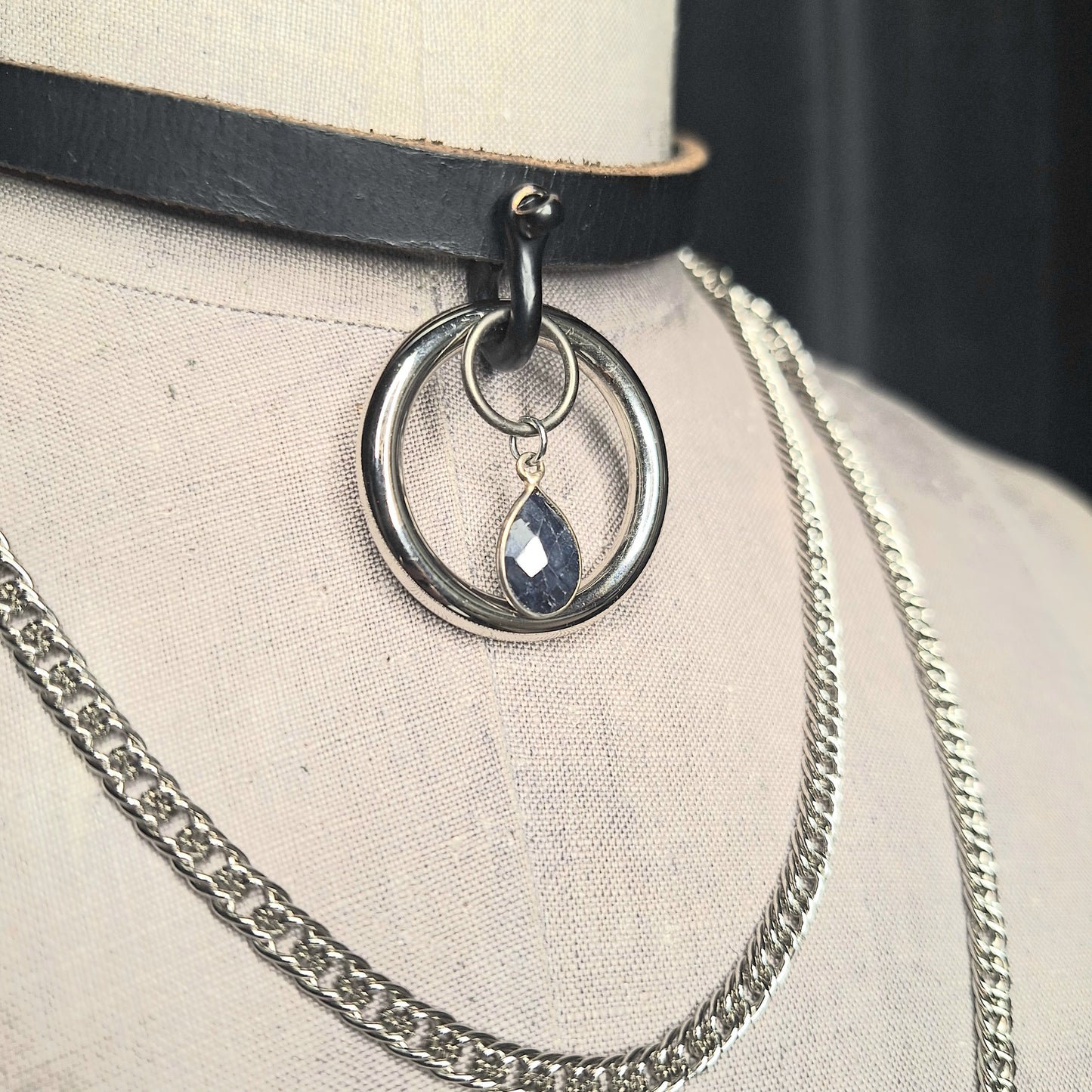 Layered,Draped Silver Chain, Sapphire, and Leather Choker. Chic Leather, 1" silver O-ring with teardrop stone. Handmade.