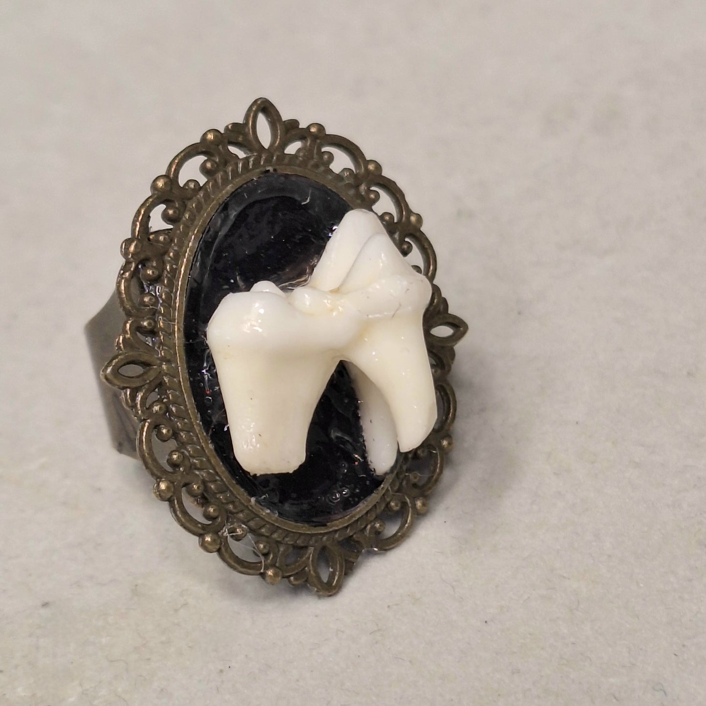 Ornate Antique Brass Cameo Tooth Ring. Adjustable size. Handmade.