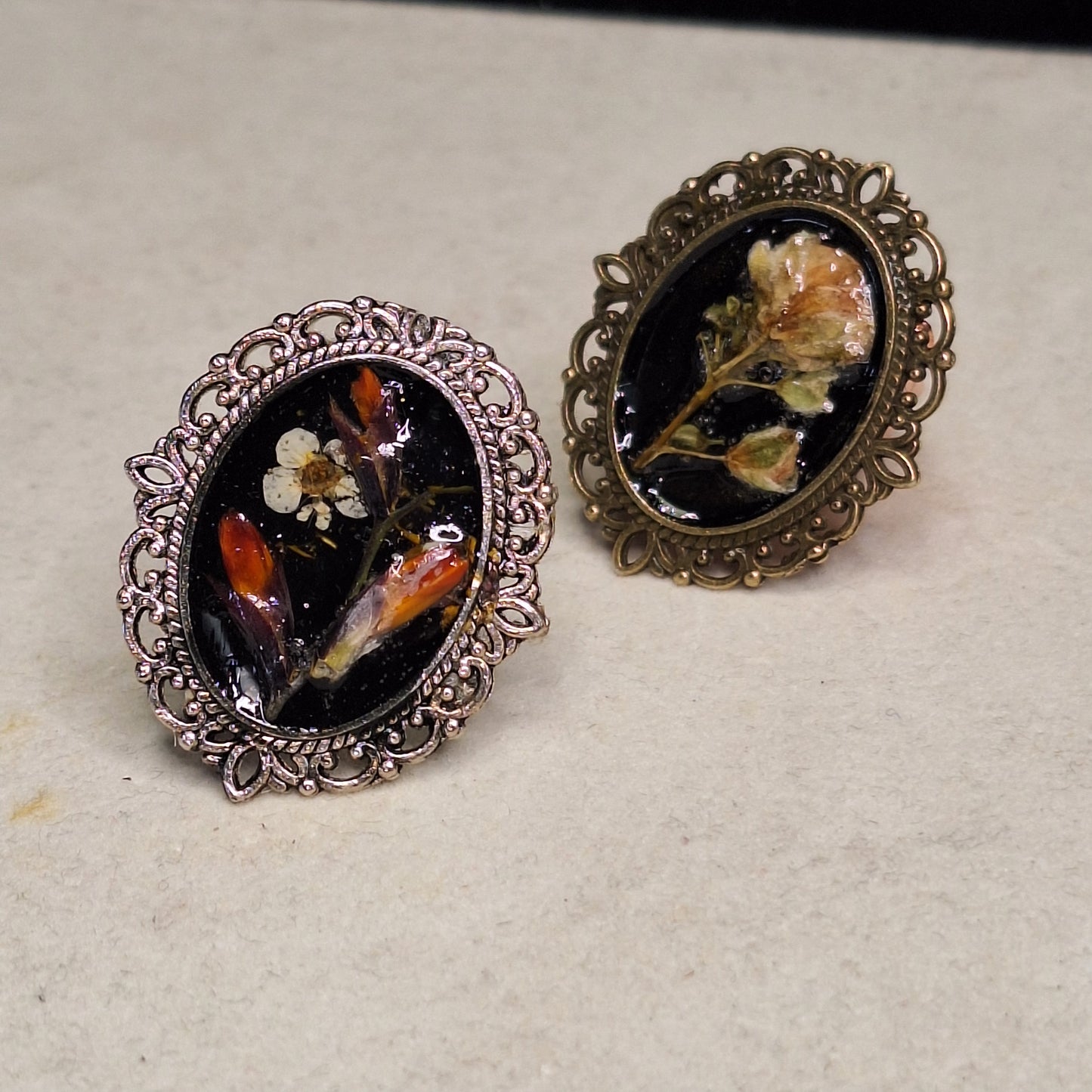 Enchanted orange flower bud, antique brass framed cameo ring. Handmade.