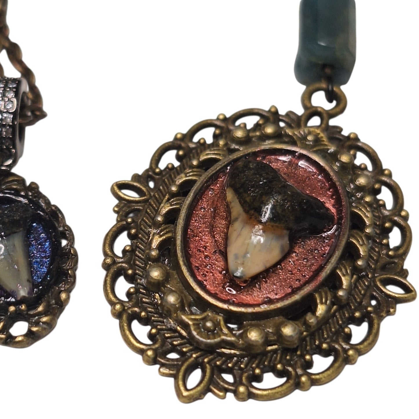 Tiny shark tooth cameo necklace. Antique layers framing. Iridescent blue backdrop.