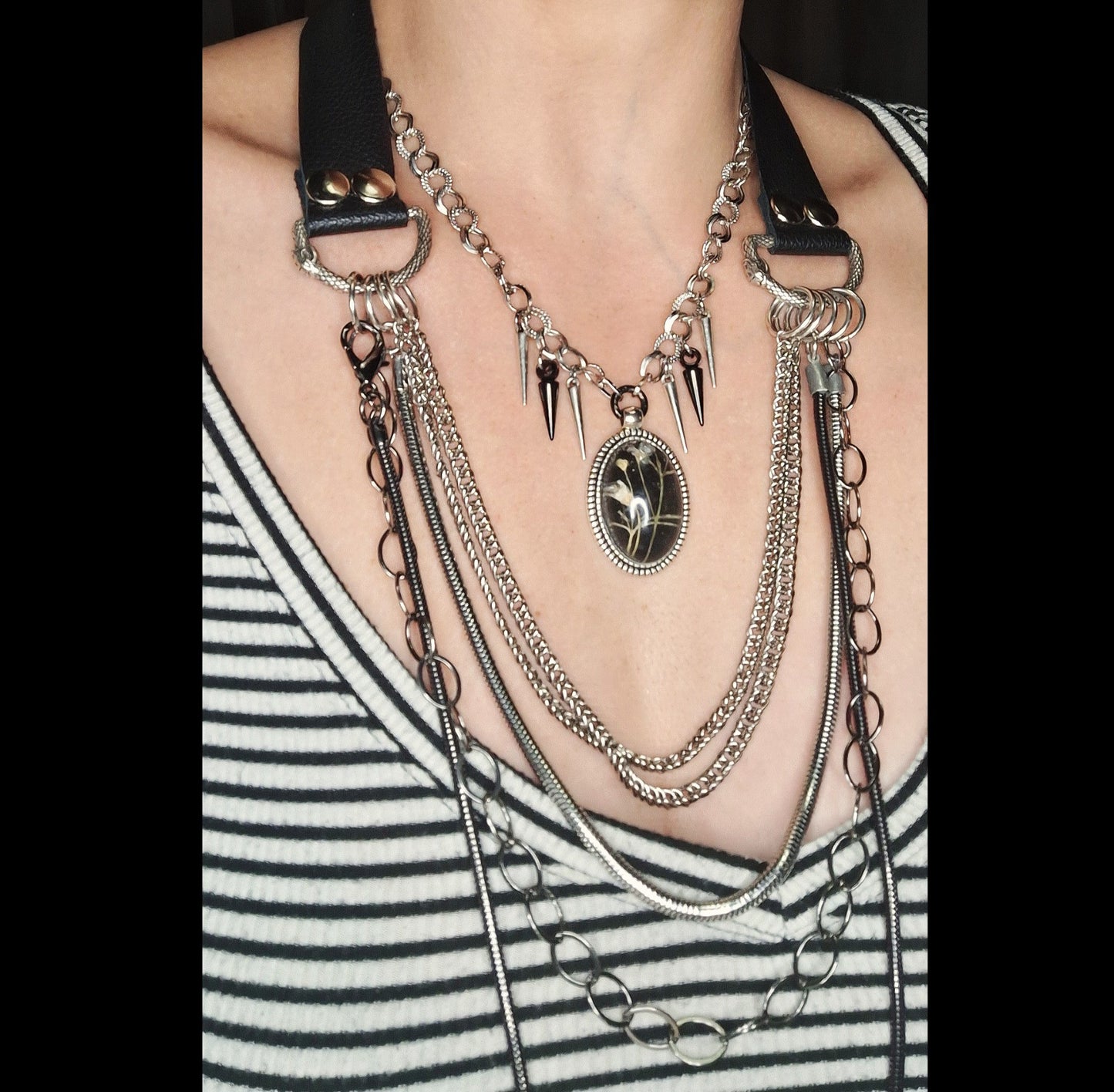 Thorny Weather. Real flower cameo pendant with a side of spikes.