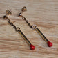 Strike it up. Gold matchstick post earrings.