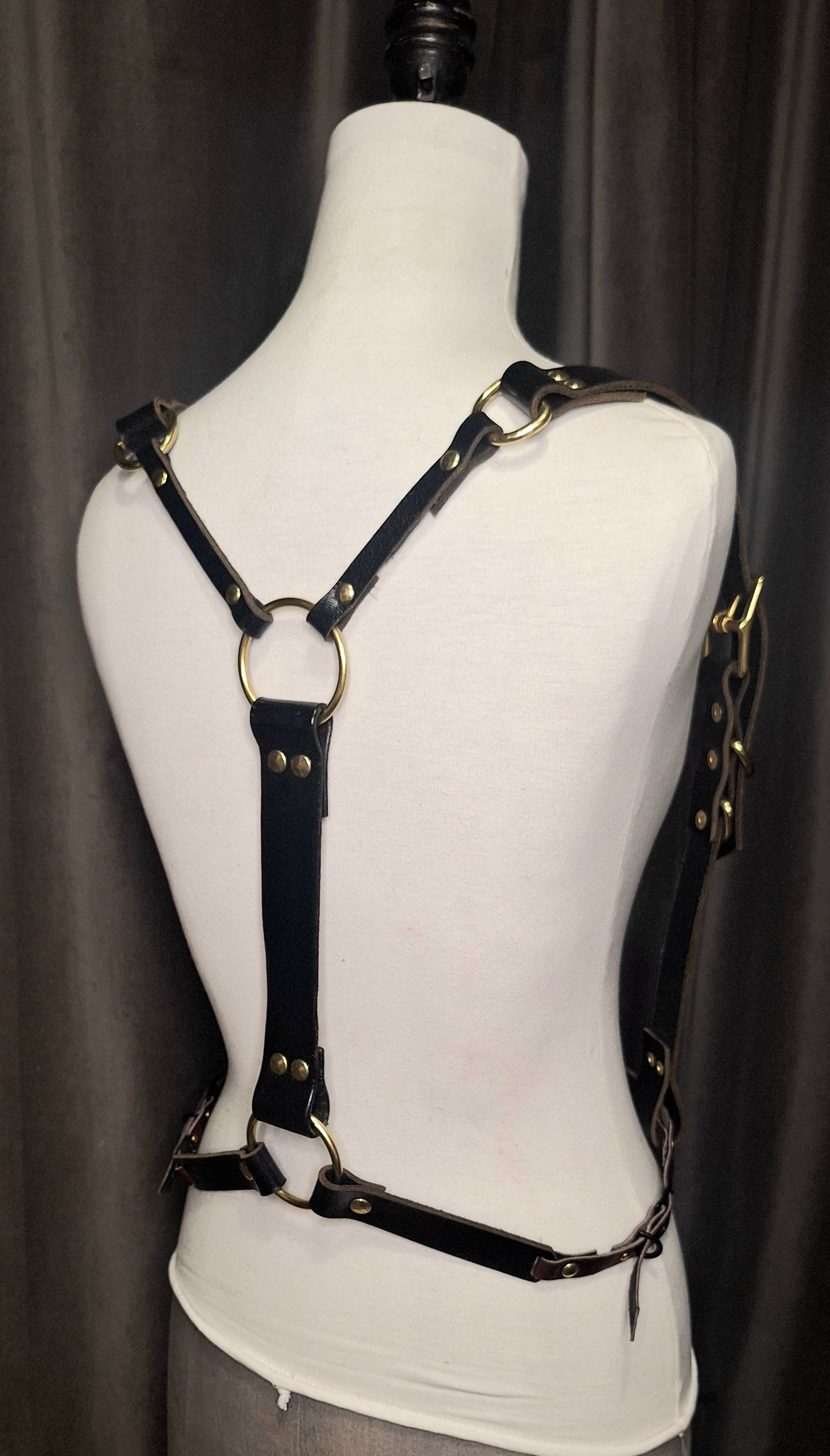 Suspense. Leather Body Harness. Gold hardware. Black leather with plum leather details.