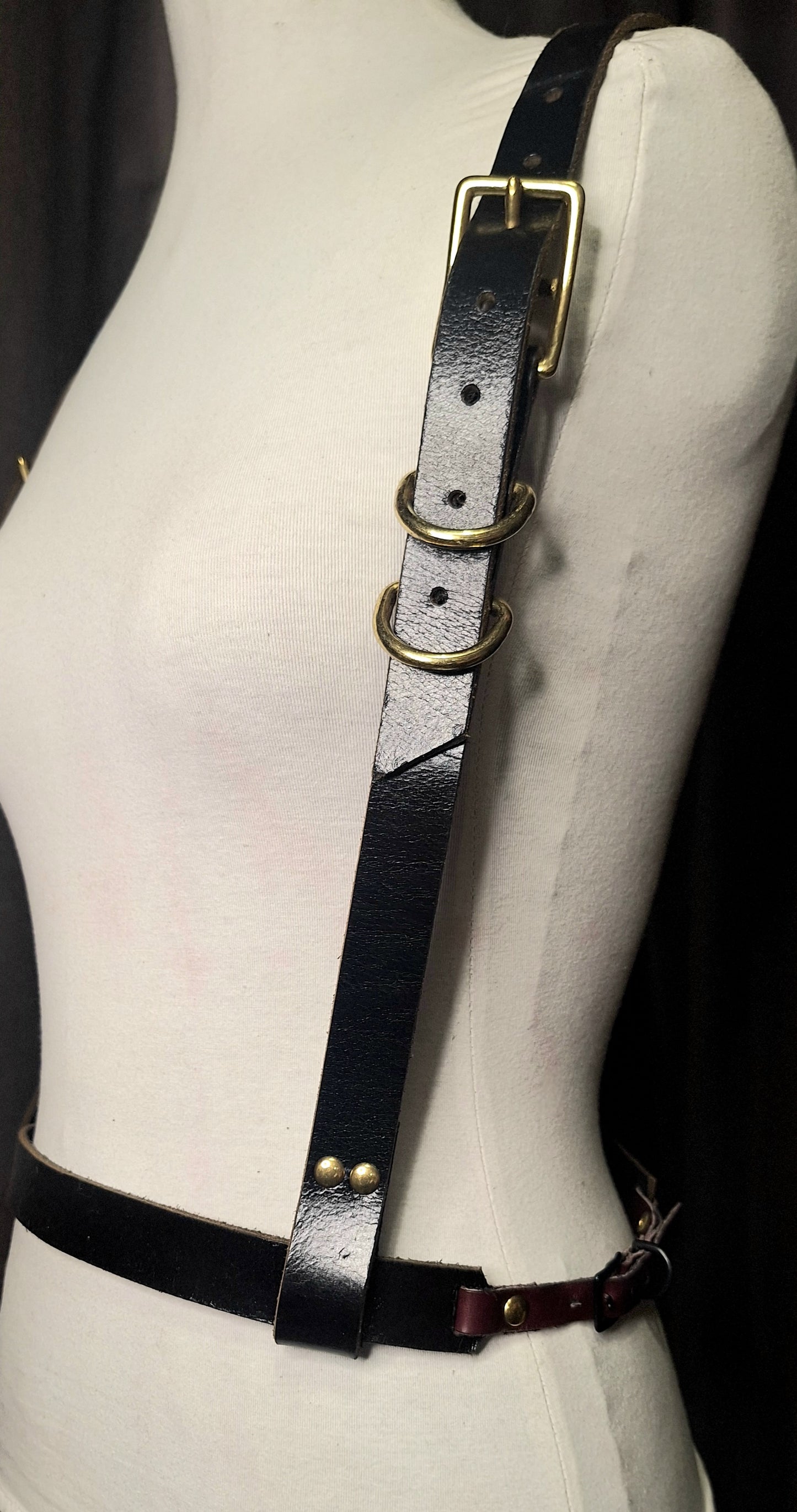 Suspense. Leather Body Harness. Gold hardware. Black leather with plum leather details.