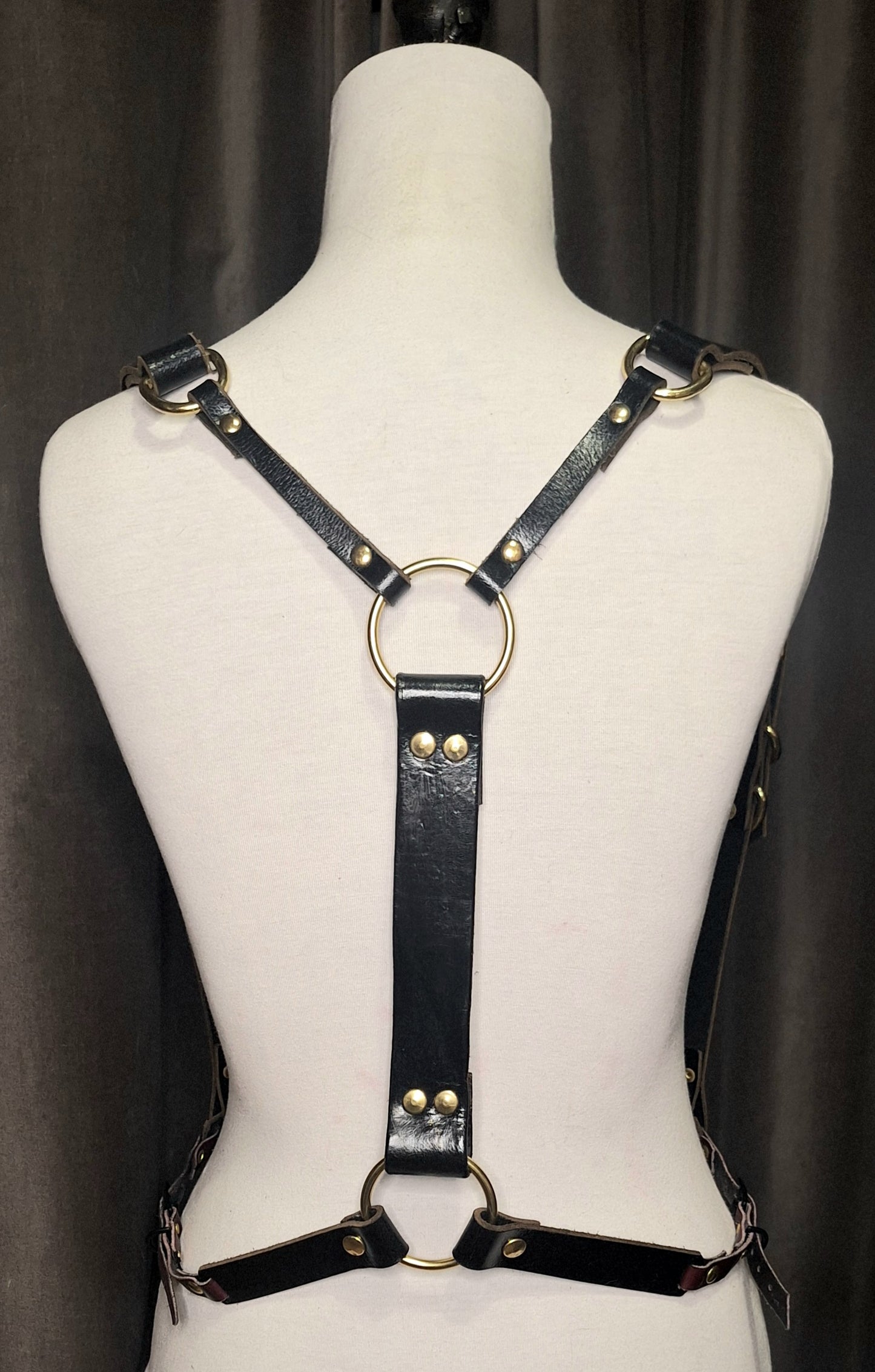 Suspense. Leather Body Harness. Gold hardware. Black leather with plum leather details.