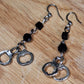 The Misdemeanor.  Silver handcuff and black bead dangle earrings. Ear hooks.