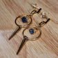 Gold spike, raw edge sapphire stone earrings with gold ring. Art deco meets gold vamp.