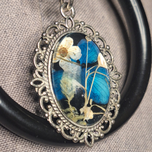 Black & Blue flower, steel Oring, and chic leather statement necklace. Handmade. One-of-a-kind.