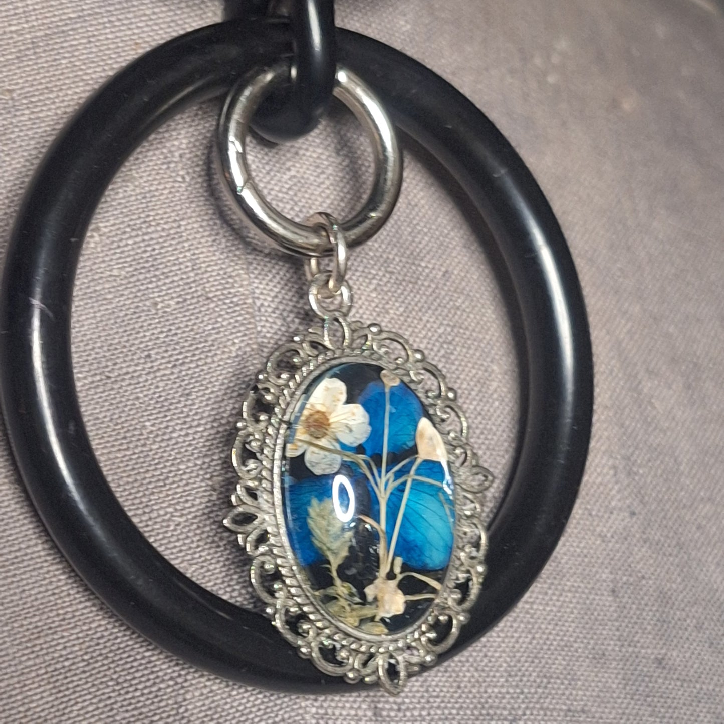 Black & Blue flower, steel Oring, and chic leather statement necklace. Handmade. One-of-a-kind.