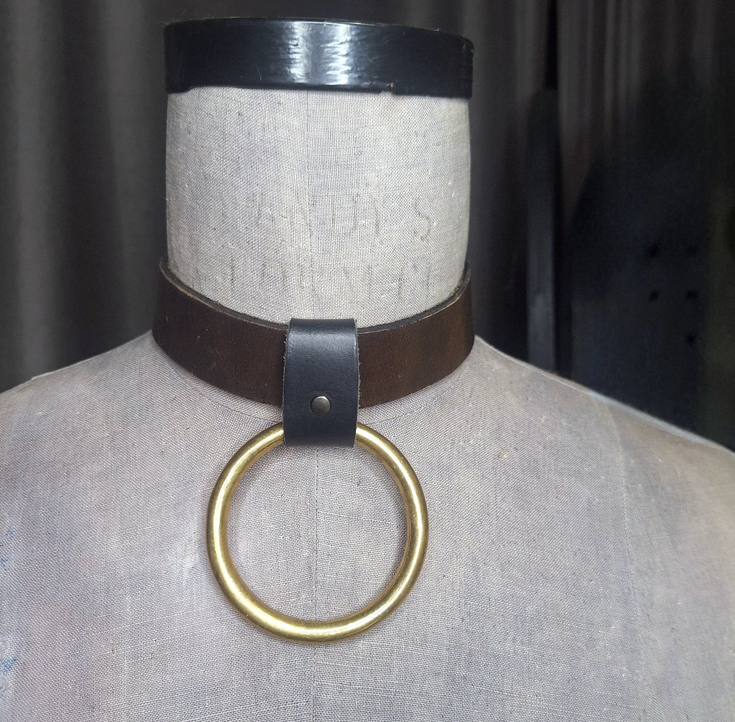 Olive leather choker with slide on 2" gold plated O-ring. Wear multiple ways. Unisex. Handmade. Adjustable buckle closure.
