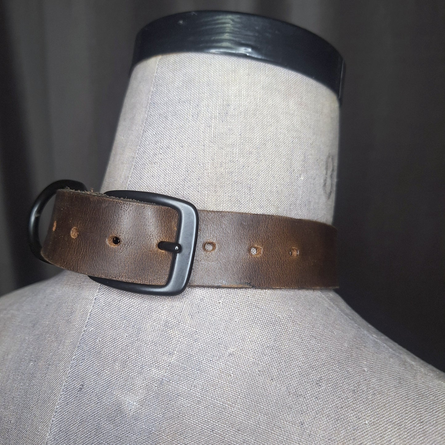Olive leather choker with slide on 2" gold plated O-ring. Wear multiple ways. Unisex. Handmade. Adjustable buckle closure.