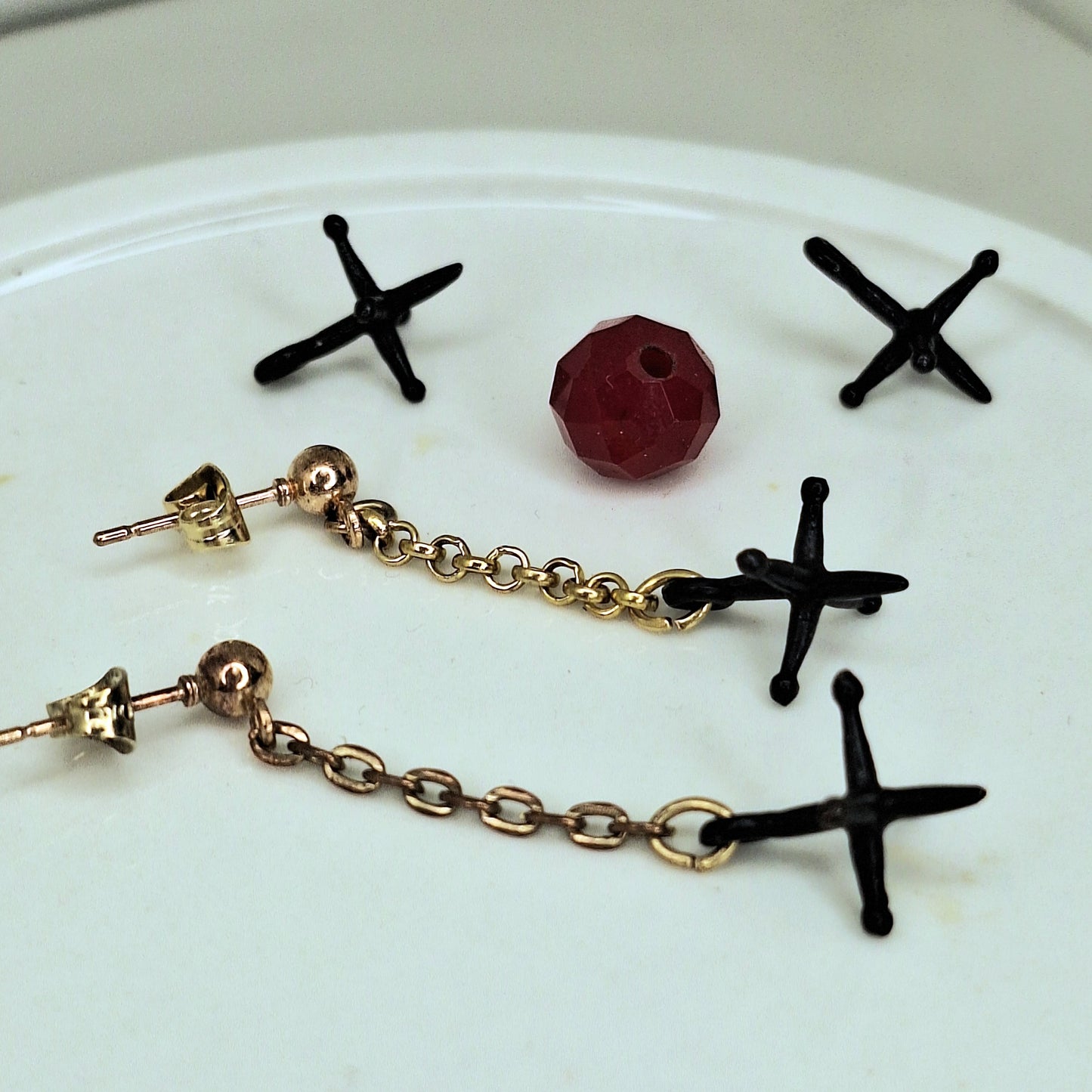 Jacks earrings. Gold chain & black jacks charms.