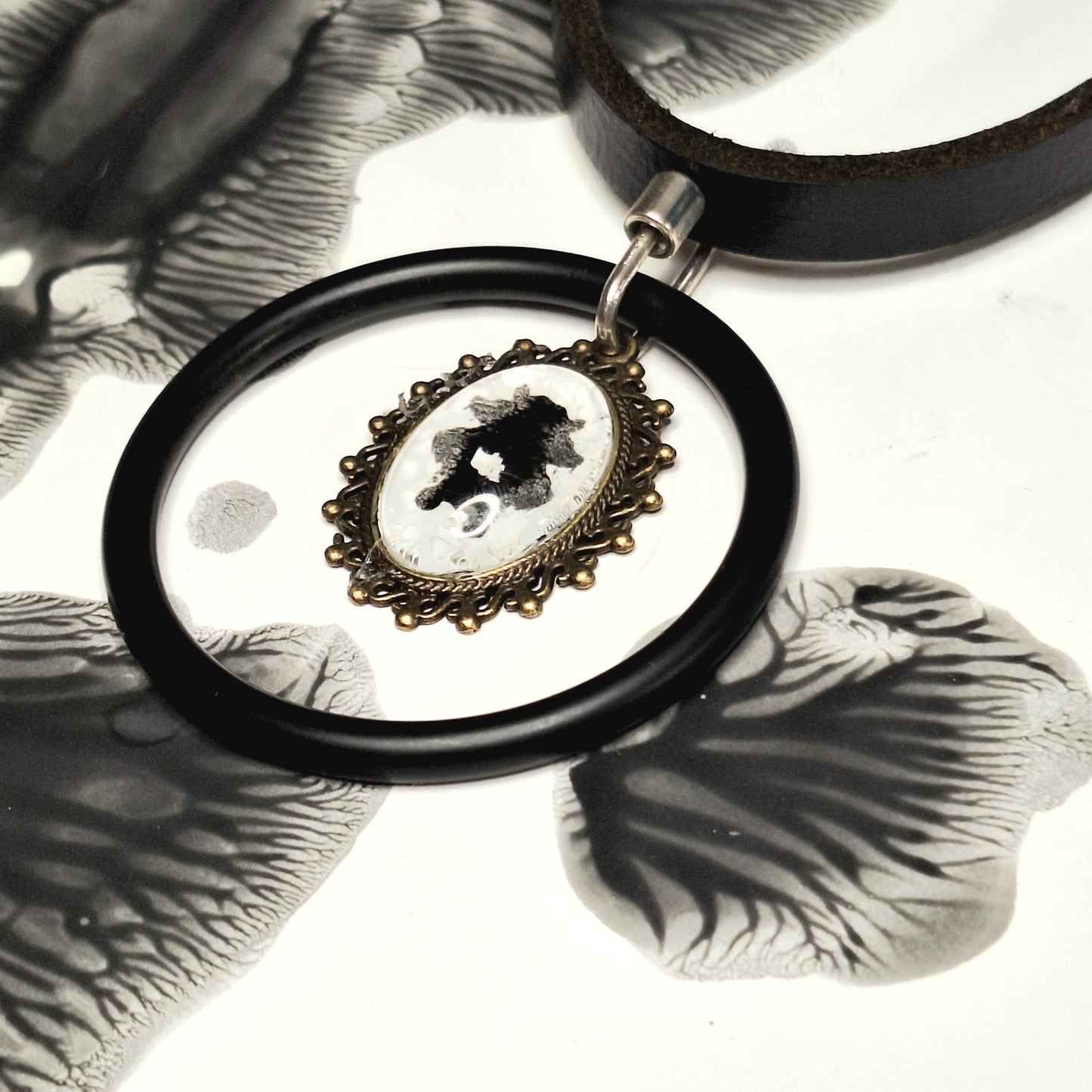 The Watchman Ink Blot Choker. Mix finishes. Antique frame, black steel O-ring.
