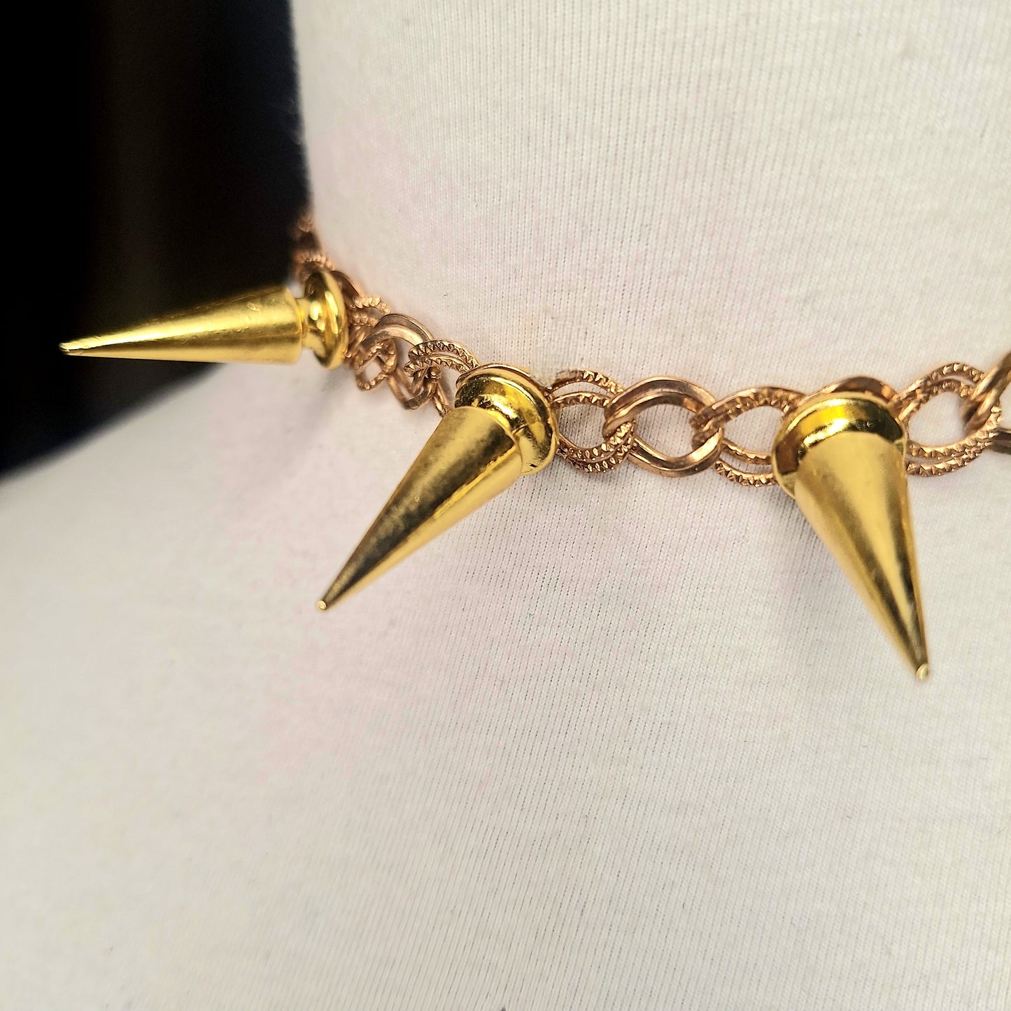 Glam Punk Gold. A spiked necklace for the sophisticated punk. Adjustable chain closure.