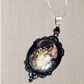 Persephone. Kinda dead, kinda alive. Statement pendant with real pressed flowers. One-of-a-kind.
