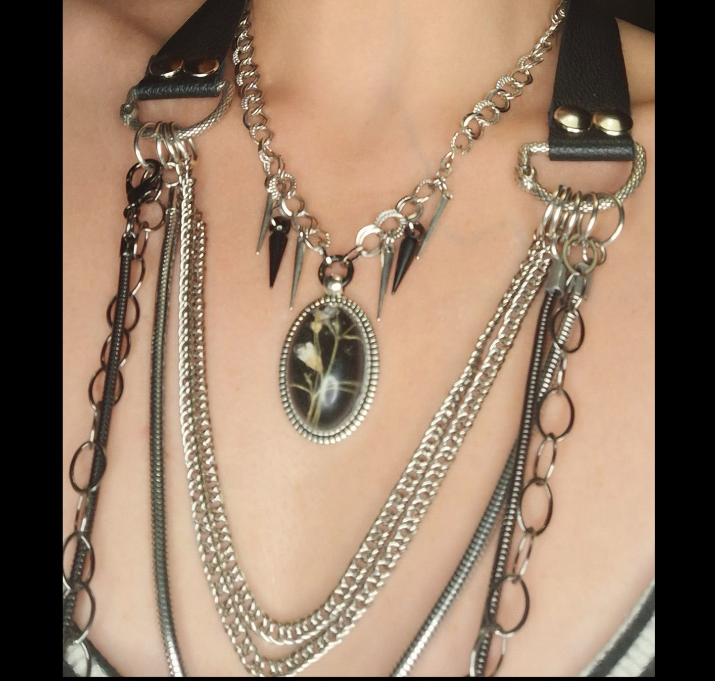 Thorny Weather. Real flower cameo pendant with a side of spikes.