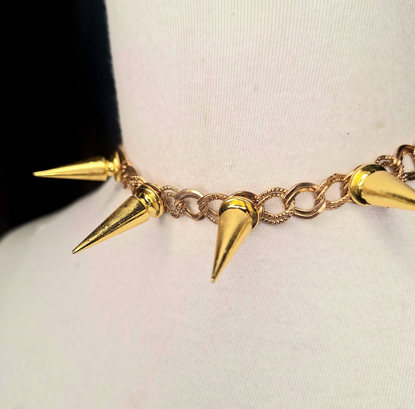 Glam Punk Gold. A spiked necklace for the sophisticated punk. Adjustable chain closure.