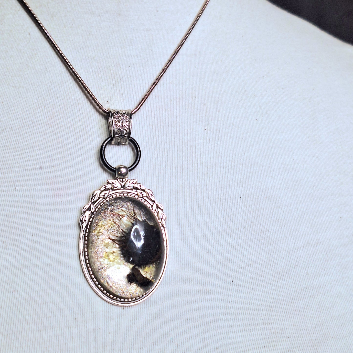 Audrey II Cameo Handmade Pendant Necklace. Silver chain and frame.